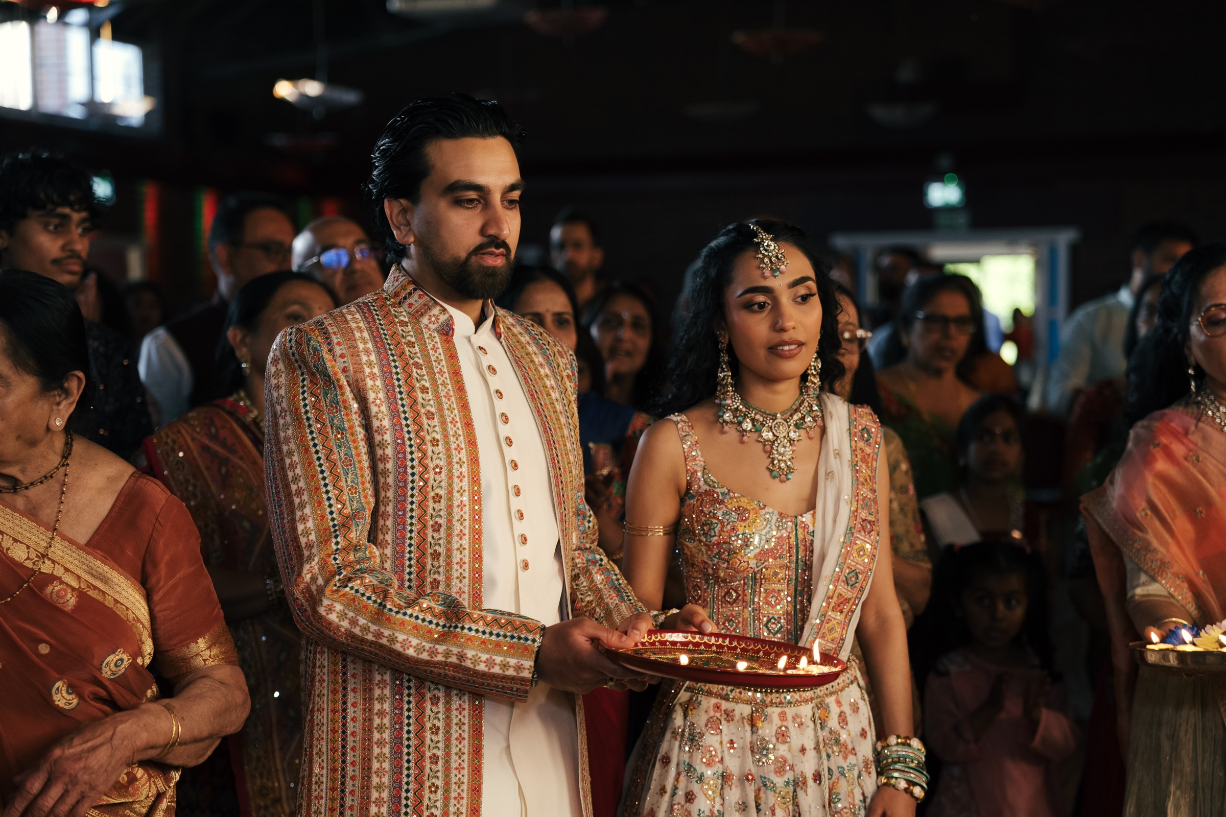 A couple immersed in a traditional ceremony